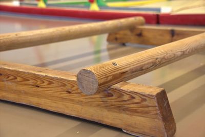 Close-up of piano keys on wooden table