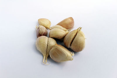 High angle view of bread against white background