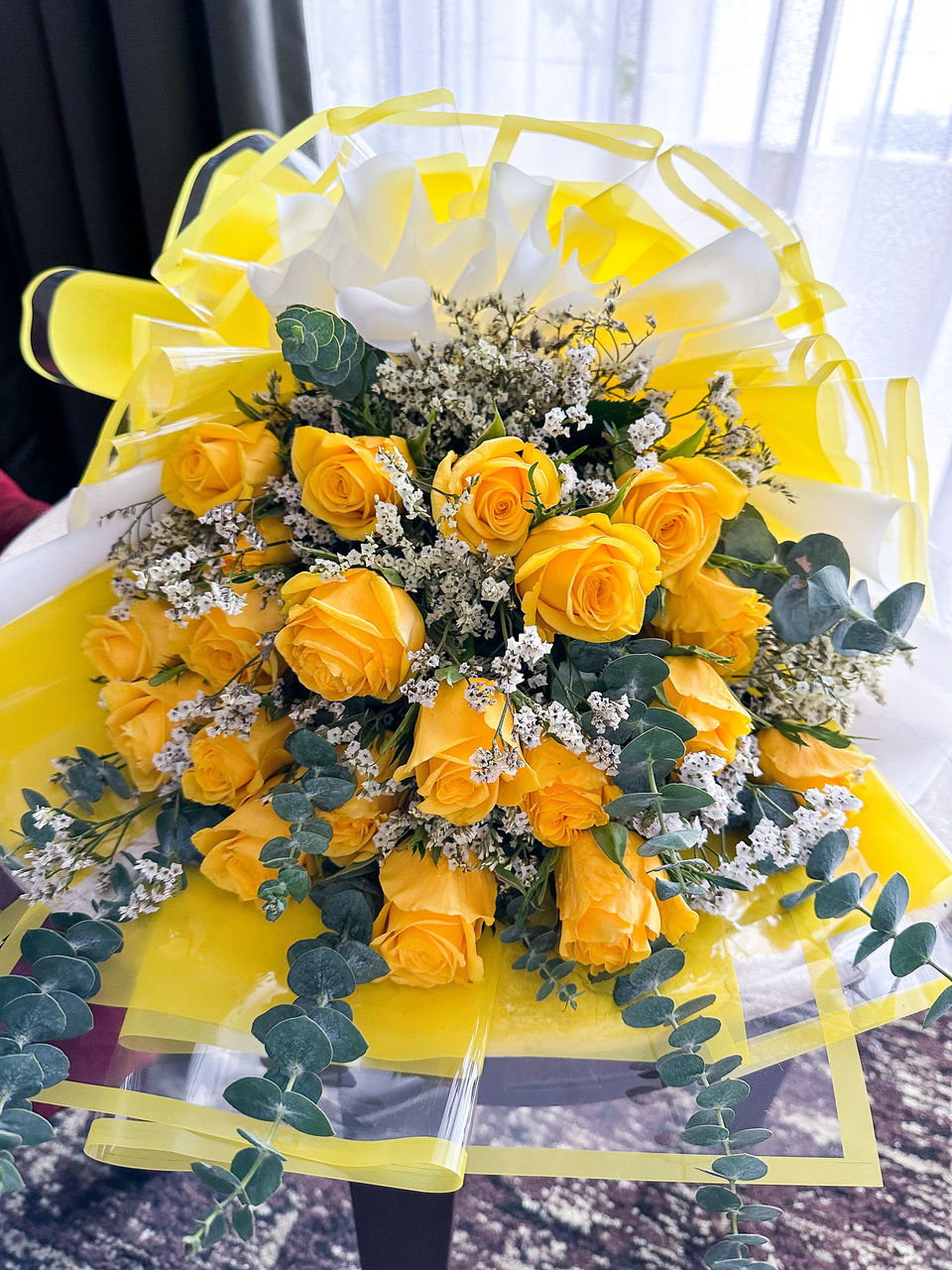 yellow, flowering plant, flower, plant, bouquet, floristry, freshness, floral design, nature, centrepiece, flower arrangement, no people, cut flowers, indoors, flower head, food and drink, beauty in nature, food, high angle view, celebration, table, decoration, arrangement, bunch of flowers