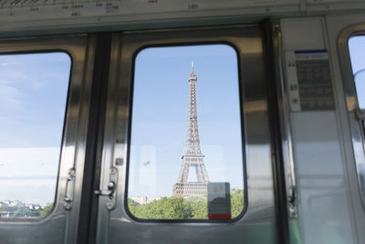 Eiffel tower seen through train door