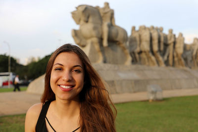 Portrait of smiling young woman