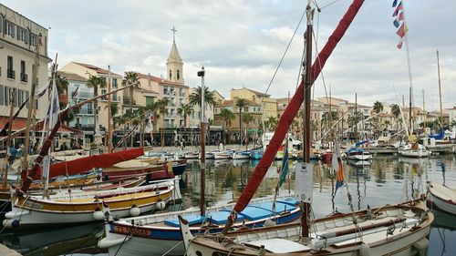 Boats moored in harbor