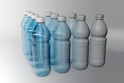 Close-up of bottles against white background