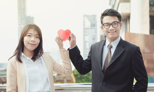 Portrait of a smiling young couple