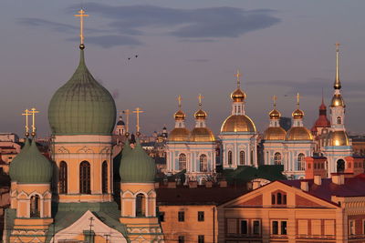 View of buildings in city against sky