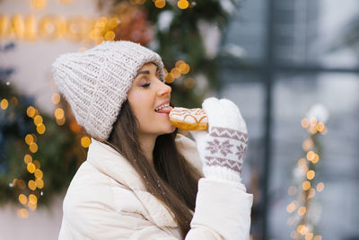 Young woman drinking juice