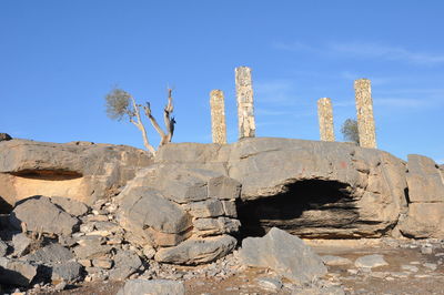 Rock formation on land against sky