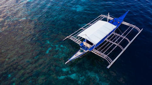 High angle view of ship sailing in sea