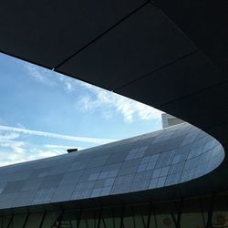 Low angle view of building against cloudy sky