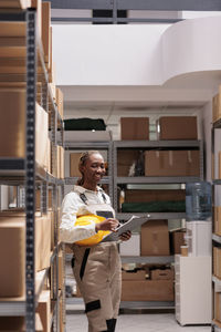 Portrait of young man working in workshop