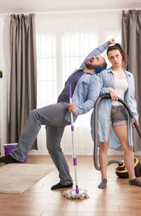 Young couple standing on floor