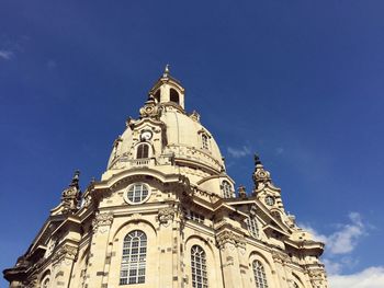 Low angle view of church against blue sky