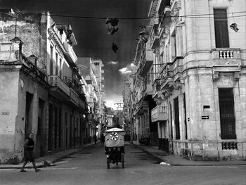 People walking on street in city