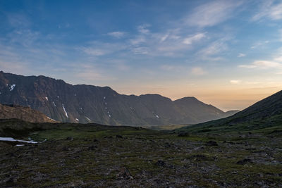 Scenic view of mountains against sky during sunset