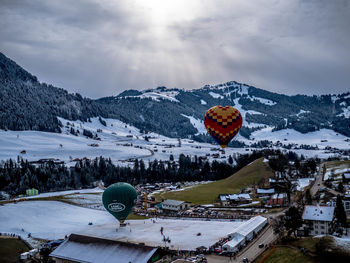 Scenic view of mountains against sky during winter