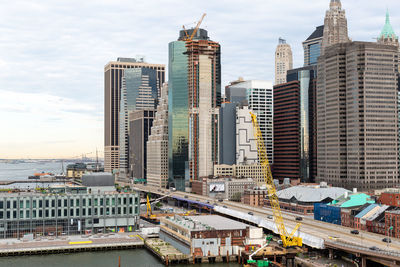 Modern buildings in city against sky