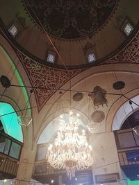 Low angle view of illuminated chandelier