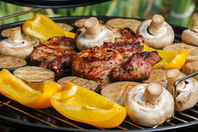 High angle view of food on barbecue grill