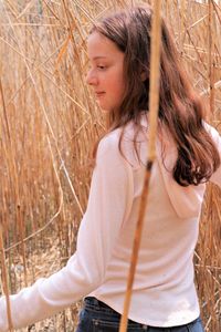 Side view of young woman looking down