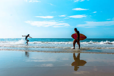 People enjoying at beach