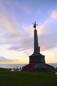 Statue of liberty against sky during sunset