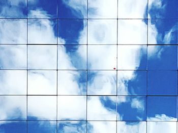 Low angle view of blue sky and clouds