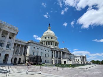 Capitol building against blue sky