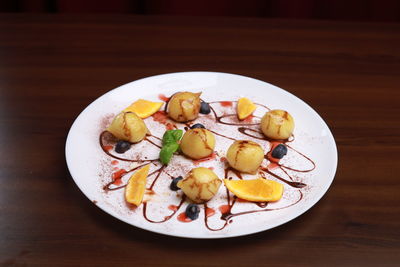 Close-up of food in plate on table