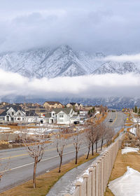 Scenic view of snow covered landscape against sky