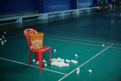 Shuttlecocks in basket at court