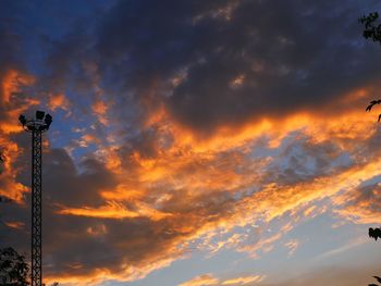 Low angle view of dramatic sky during sunset