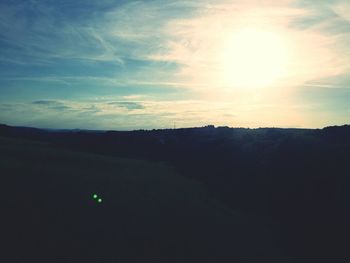 Scenic view of landscape against sky during sunset