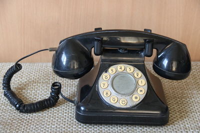 High angle view of telephone on table