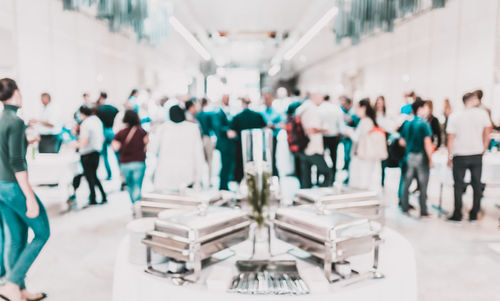 High angle view of people walking at airport