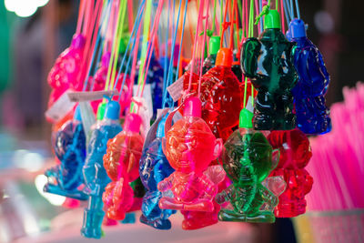 Close-up of multi colored toys for sale at market