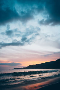 Scenic view of sea against sky during sunset