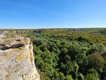 Scenic view of landscape against clear blue sky