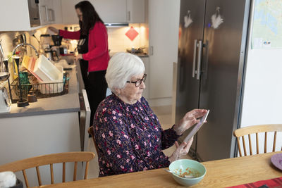 Senior woman using digital tablet