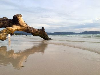 Scenic view of beach against sky