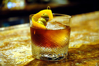 Close-up of cocktail in glass on table