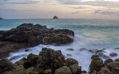 Scenic view of sea against sky during sunset