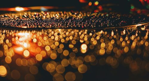 Close-up of illuminated lights at night