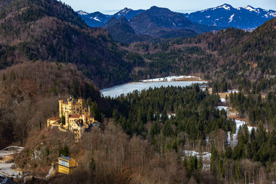 Panoramic view of trees and mountains against sky