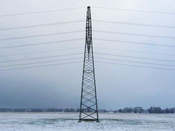 Electricity pylon against sky