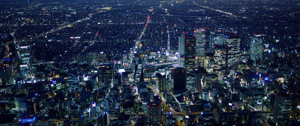 High angle view of city lit up at night, tokyo-japan