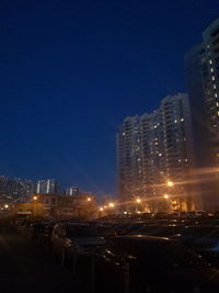 Illuminated cityscape at night