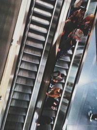 High angle view of people on escalator
