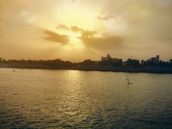 Scenic view of sea at sunset