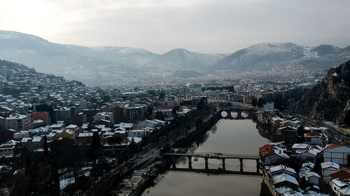 High angle view of buildings against sky during winter