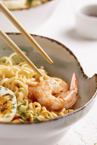 Traditional asian food, ramen soup with shrimps